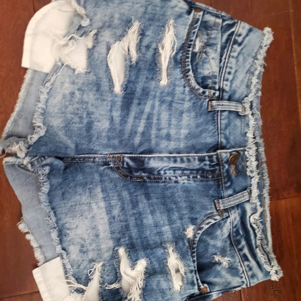 Rewash jean stretchy shorts size 9 , distressed with packets sticking out